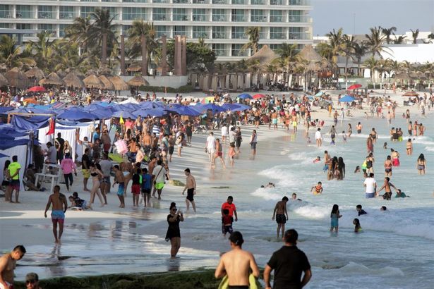 Tourists at Cancun Beach Forum