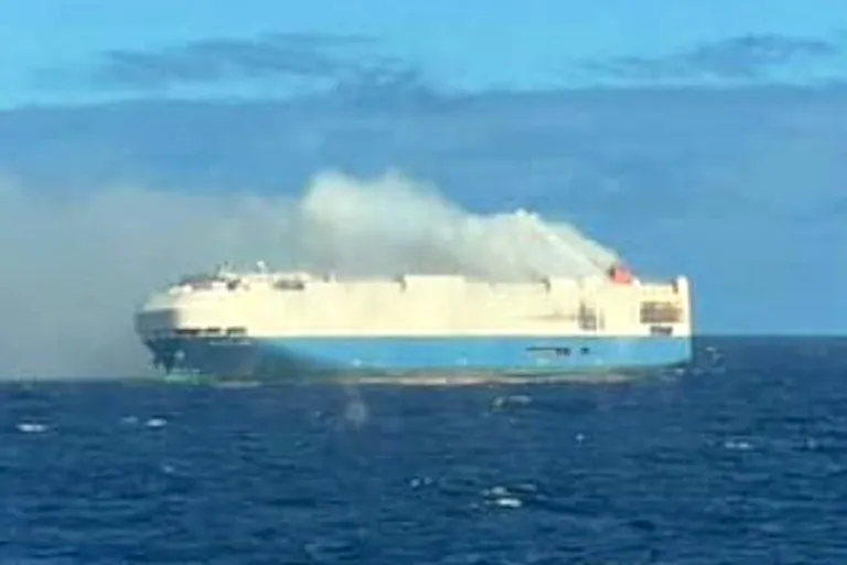 A cargo ship full of luxury cars is burning in the middle of the Atlantic: there’s a Porsche and a Volkswagen