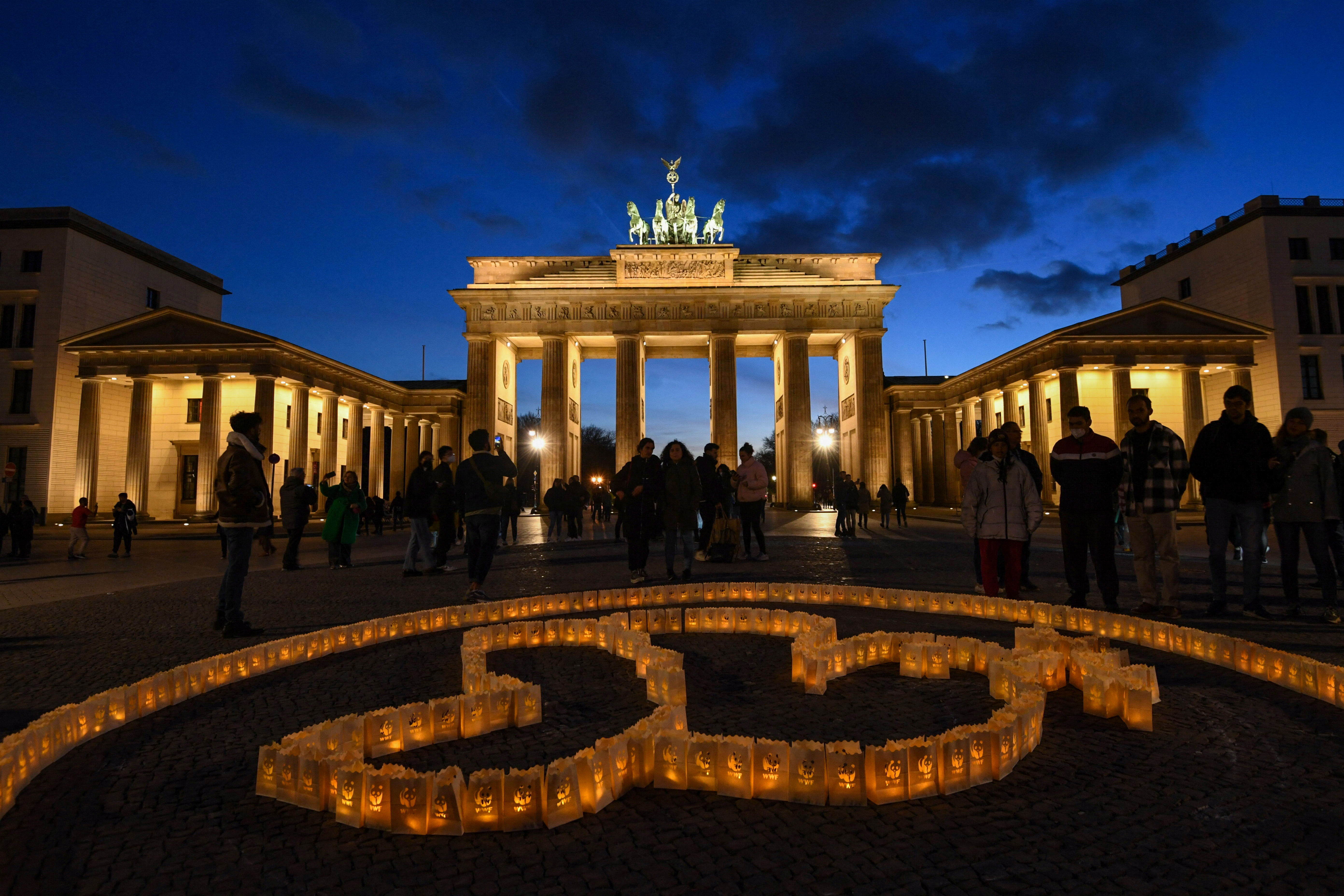 A dove of peace in solidarity with the victims of the Russian invasion of Ukraine installed by LED lights in front of the Brandenburg Gate before the lights go out to celebrate Earth Hour in Berlin, Germany, March 26, 2022. REUTERS/Annegret Hilse