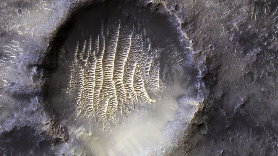 They found a “human fingerprint” inside the crater of the Martian volcano