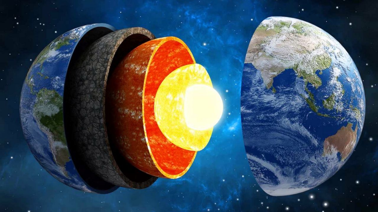 What are the two giant spots in the depths of planet Earth?