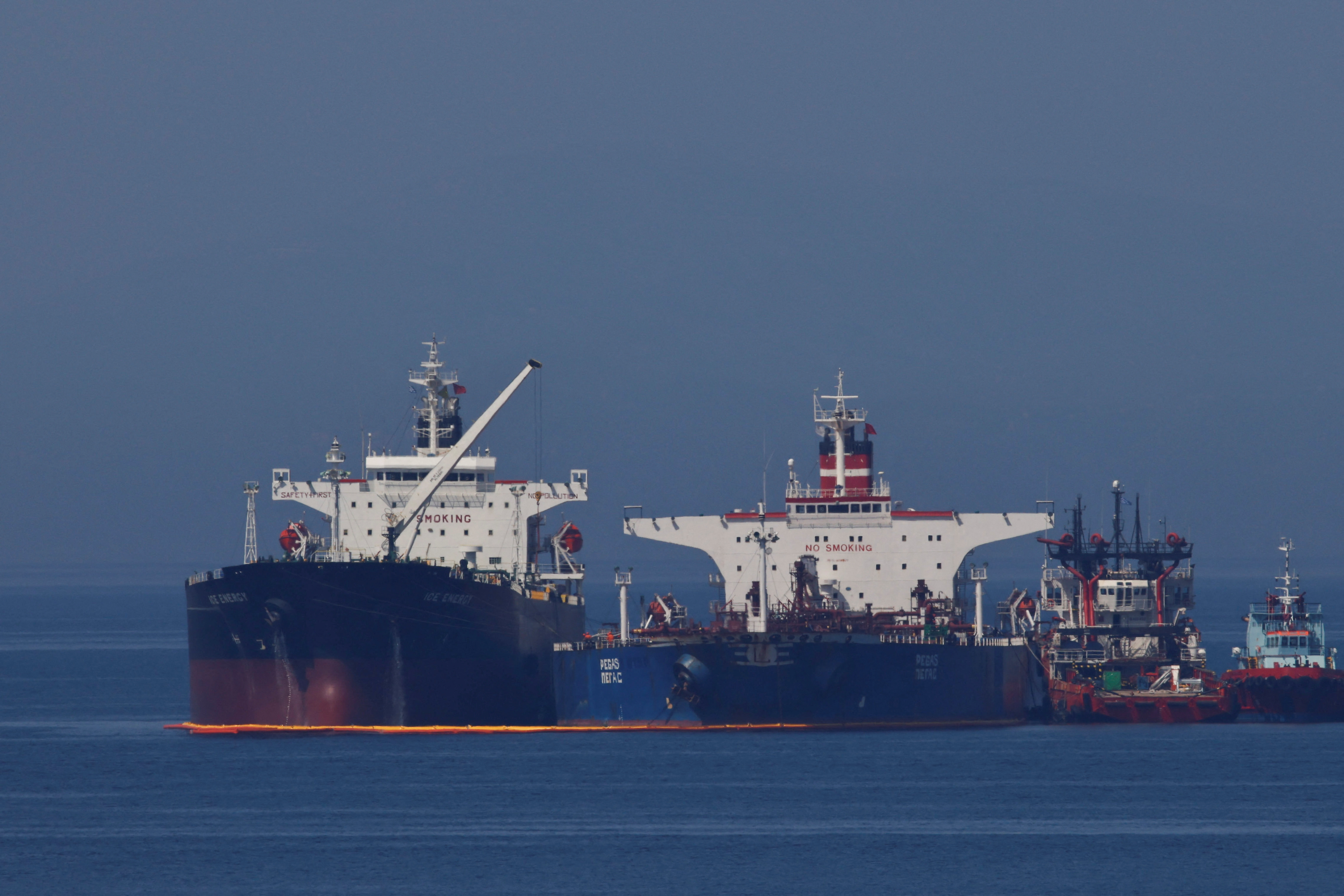 The Liberian ship Ice Energy transports oil to the Iranian vessel Lana (former Pegas) off the coast of Karistos, Greece (REUTERS/Costas Baltas)