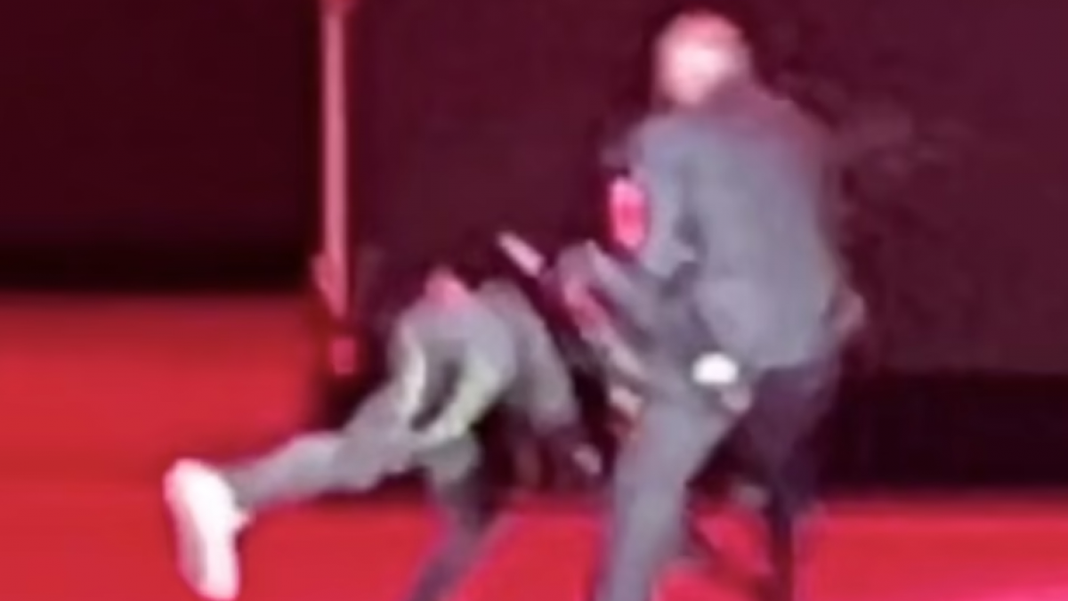 A man lunges at comedian Dave Chappelle in the middle of the show