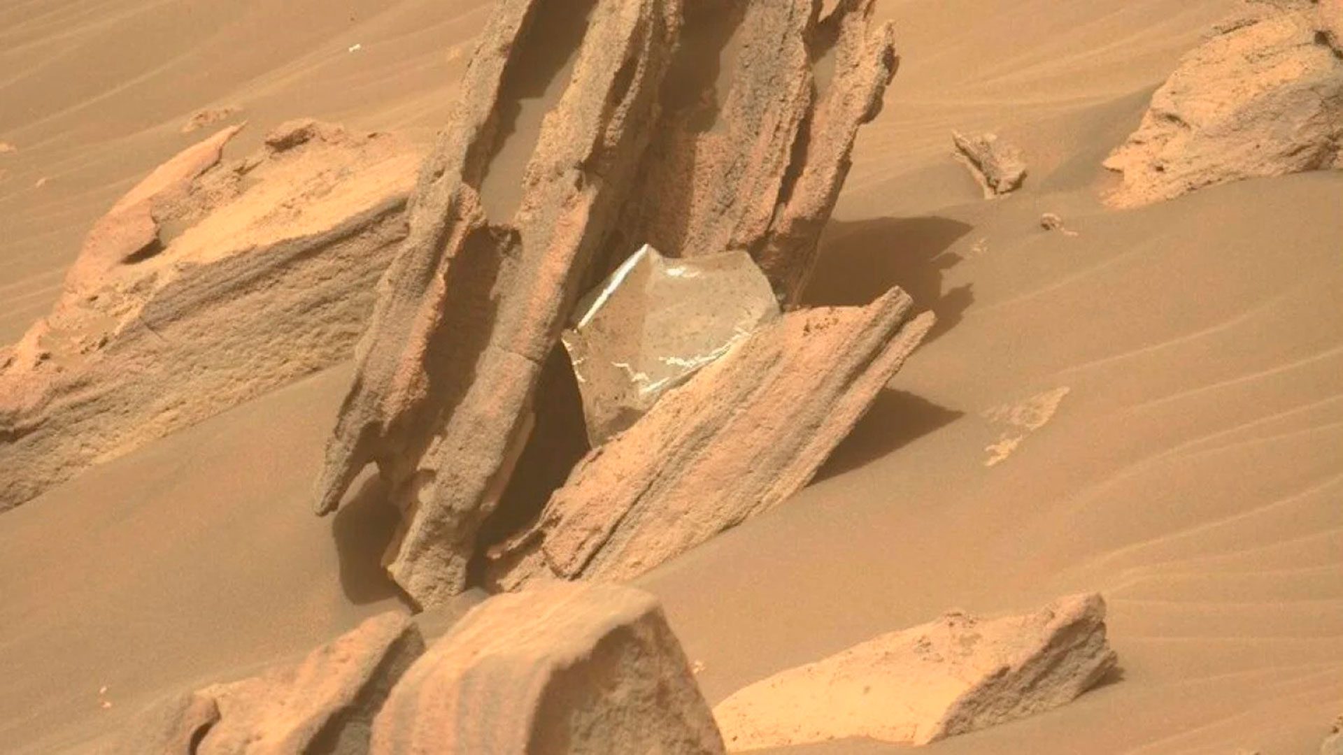 The rover reached the base of the delta in April.  He soon discovered gray, thin rocks called shale, which could have formed from sediments deposited by a slow-moving river or lake.