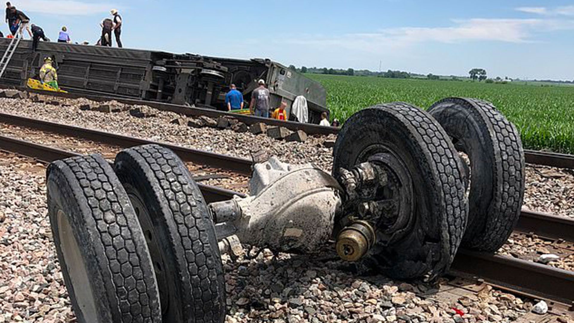 The train derailed after colliding with a dump truck