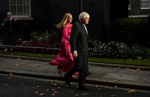 Outgoing British Prime Minister Boris Johnson and his wife Carrie have pulled out after Johnson delivered his final speech at 10 Downing Street