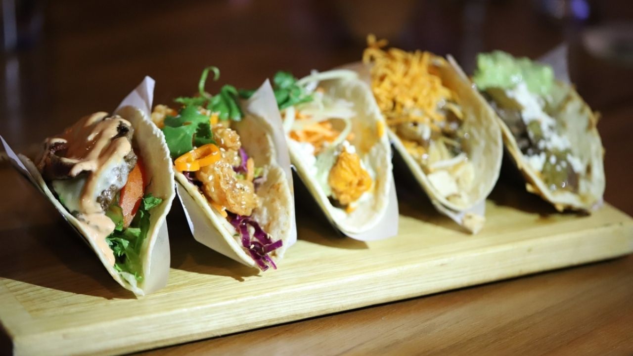 Why is National Taco Day celebrated in the United States on October 4th?
